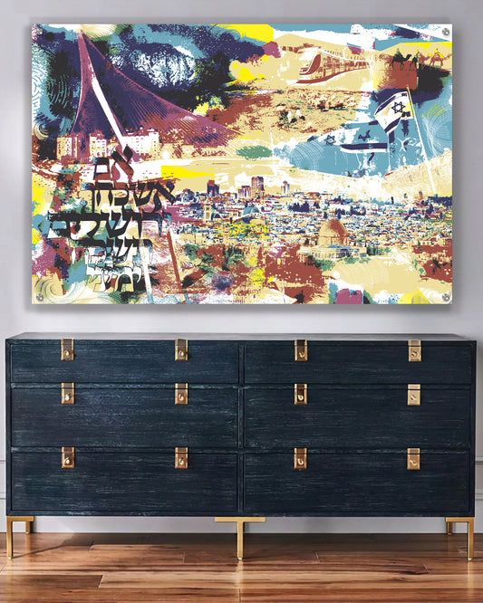 A colorful abstract Jerusalem cityscape wall art print hanging above a dark blue wooden dresser with gold hardware.